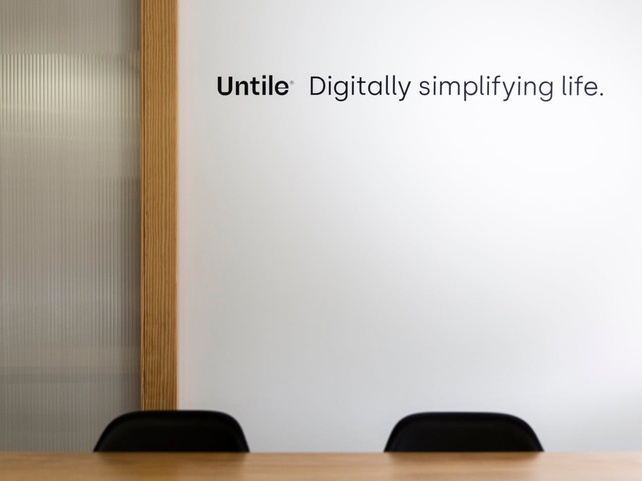 The Untile motto on the office wall